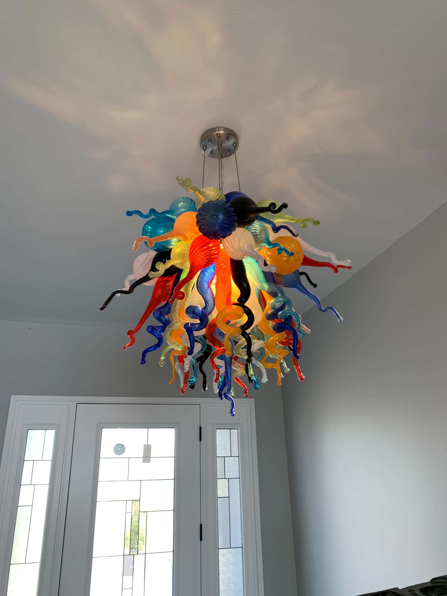 Blown glass chandelier in an entryway